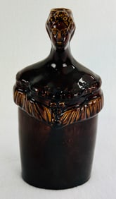 Rockingham Glazed Figural Woman Bottle