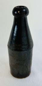 9 1/2" W W Wright Lemon Beer Stoneware Bottle