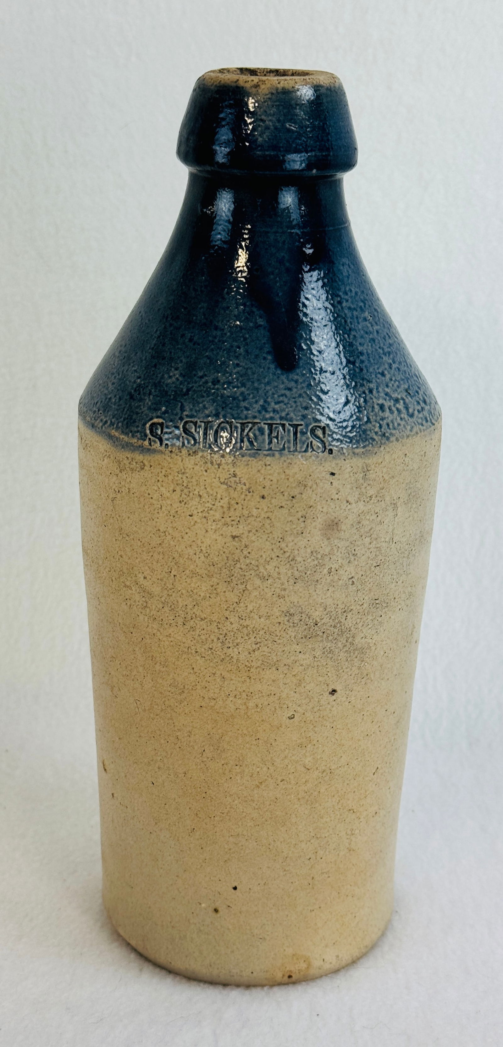 S. Sickles Stoneware Bottle