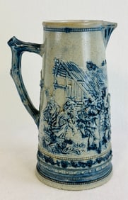 Whites Utica Blue And White Molded Stoneware Pitcher