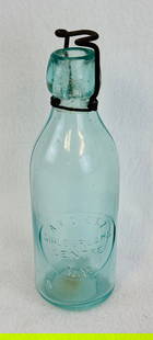 A. F. Dietz Guilderland Centre N.Y. Soda Bottle: Scarce 7" aquamarine squat type soda bottle which is embossed in a circular slug plate at front A. F. Dietz / Guilderland / Centre / N.Y.. Condition - fine with just a slight amount of internal haze.