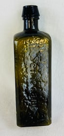 Scarce Variant Udolpho Wolfes Schnapps Bottle