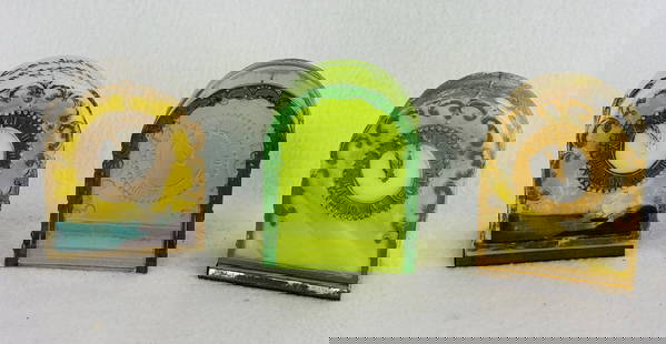 Lot 3 Mantle Clock Figural Candy Containers: Lot of three figural glass candy containers in the form of mantle clocks two of which retain their original paint and closures and are of milk glass while the third is made of green glass with no pain