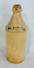 Stoneware Bottle H L SHELDON