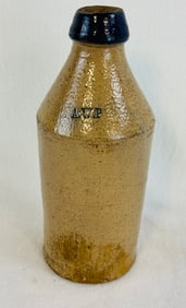 Stoneware Bottle A.W.P. w Blue Top
