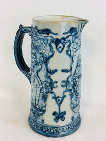 Blue & White Molded Stoneware Pitcher 9 1/4"