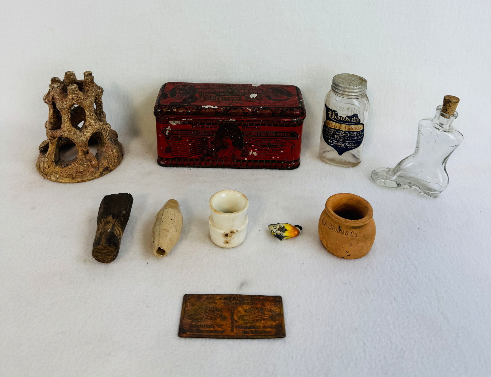 Lot Misc Items Including Advertising Etc: Lot of various items to include a Chichester's English Pennyroyal Pills tin (flaking), woman's high top shoe bottle, Hornby's Fruit Tablets Bottle w label, miniature redware bean pot impressed C A Bri