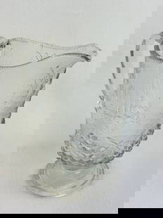 Admiral Dewey Pattern Glass Pitcher: 8 3/4" pressed pattern glass pitcher in the Admiral Dewey pattern. Condition - fine, there is a in making straw line at rim and there is a odd spot on the lip where the glass did not fill out the mold