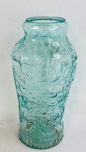 12 1/2" Aquamarine Goofus Glass Pickle Jar: 12 1/2" aquamarine goofus glass pickle jar which is decorated with florals and has three ornate panels. Condition -1/2" hairline from lip otherwise fine. Note: Most items in this auction we will offer