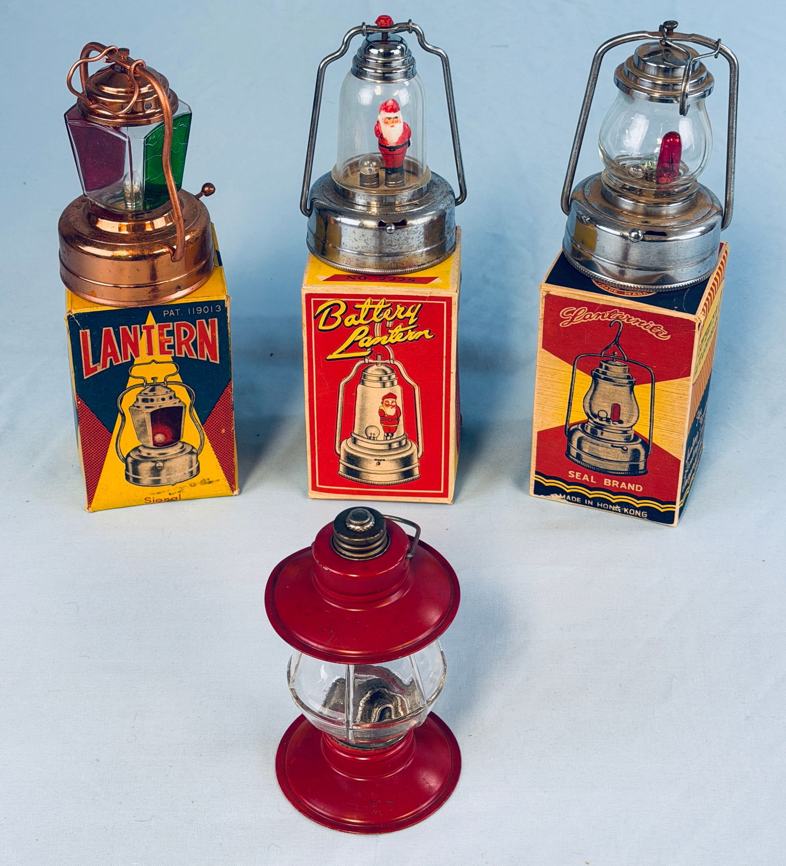 Lot 4 Electric Battery Lanterns 3 With Boxes: Lot of four vintage electric battery lanterns three of which are in their original colorful boxes. Condition - is as shown.