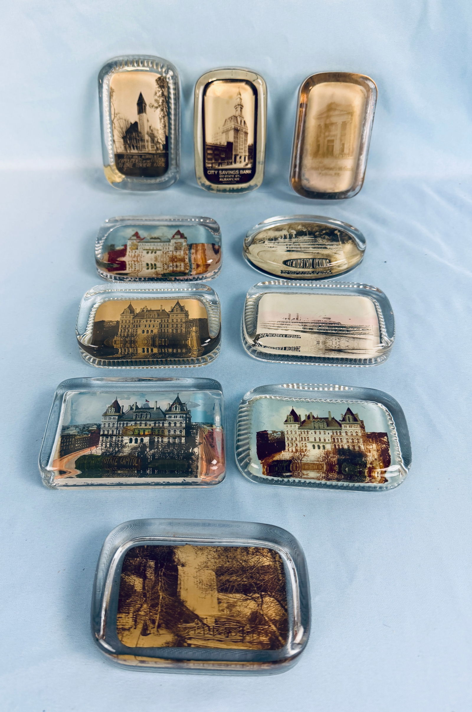 Lot 10 Antique Advertising & Souvenir Paperweights: Lot of ten various heavy glass advertising and souvenir paperweights. Condition - is as shown.