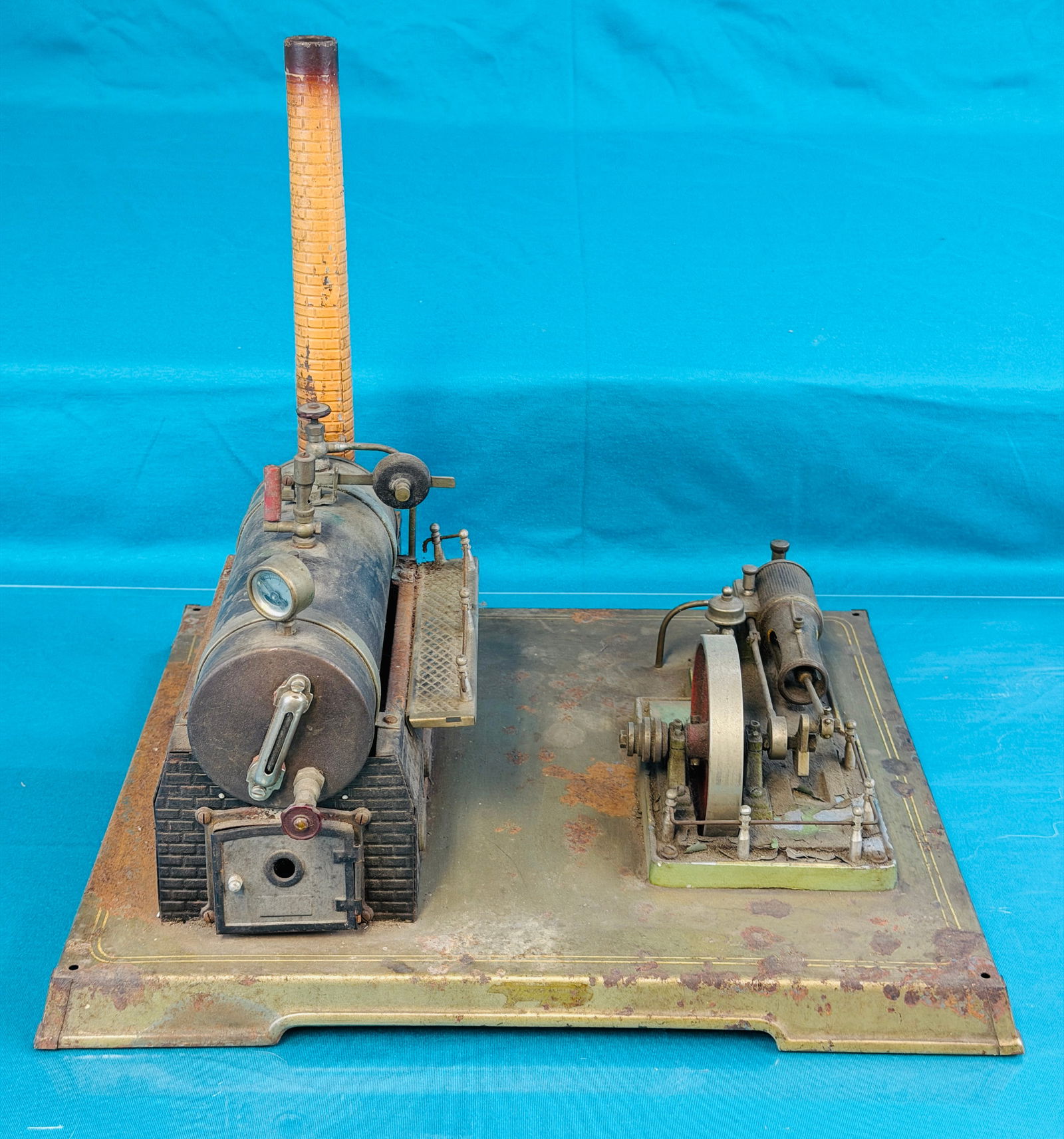 Large Marklin Toy Steam Plant: Large Marklin German made toy steam plant which measures approximately 15 1/2" wide by 13 1/2" deep by 13 1/4" tall to the top of the smokestack. Condition - lacks burners and is in need of restoratio