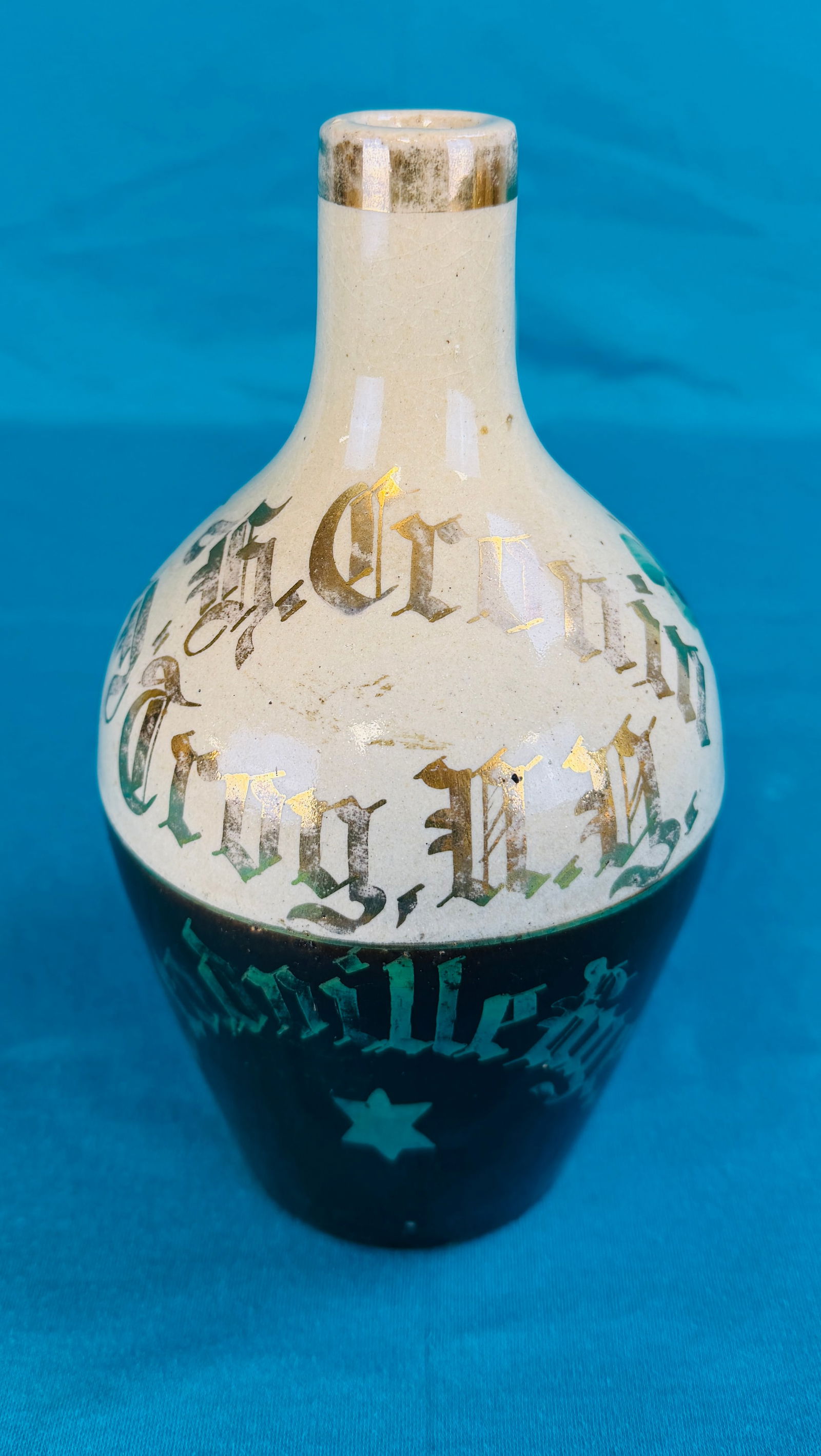 Late 19th C Cronin Troy NY Meadville Rye Jug: Late 19th century pottery jug for Cronin Troy New York Meadville Rye. Jug measures approximately 8 1/2" tall with gold stencil decoration along with multi color hand painted florals. Condition - jug i