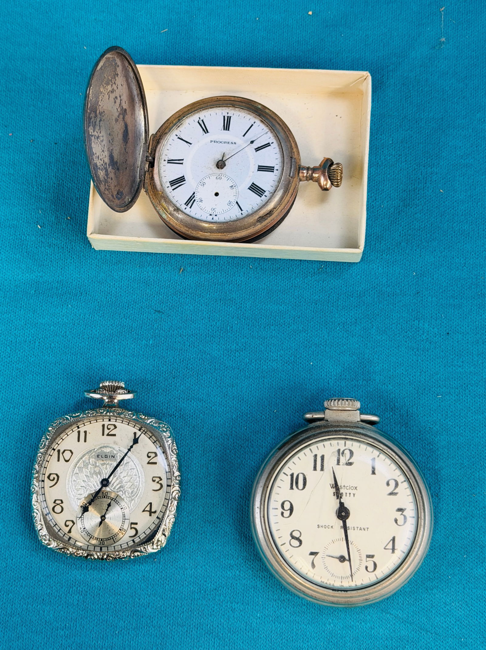 Lot 3 Pocket Watches Including Elgin 12 Size: Lot of three pocket watches to include a 12 size gold filled Elgin pocket watch in running condition and which I believe is in a gold filled case (not able to get back off to show works); a so called