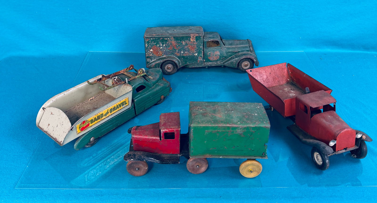 Lot Of Four Pressed Steel Trucks (1 of 2)