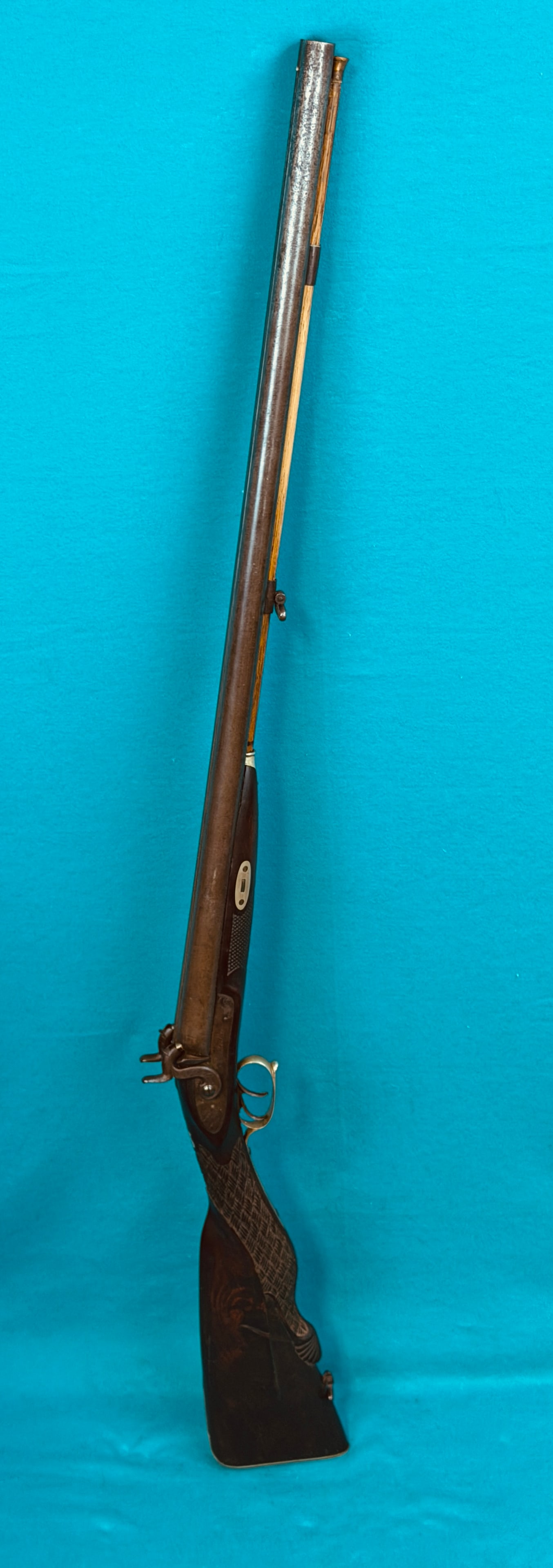 Antique Shotgun Marked Blatterlein Brooklyn: Exceptional antique shotgun with ornately carved stock in the Germanic manner which is marked on the lock plates Blatterlein Brooklyn. Shotgun has ornate basketweave style carving at wrist and a stipp