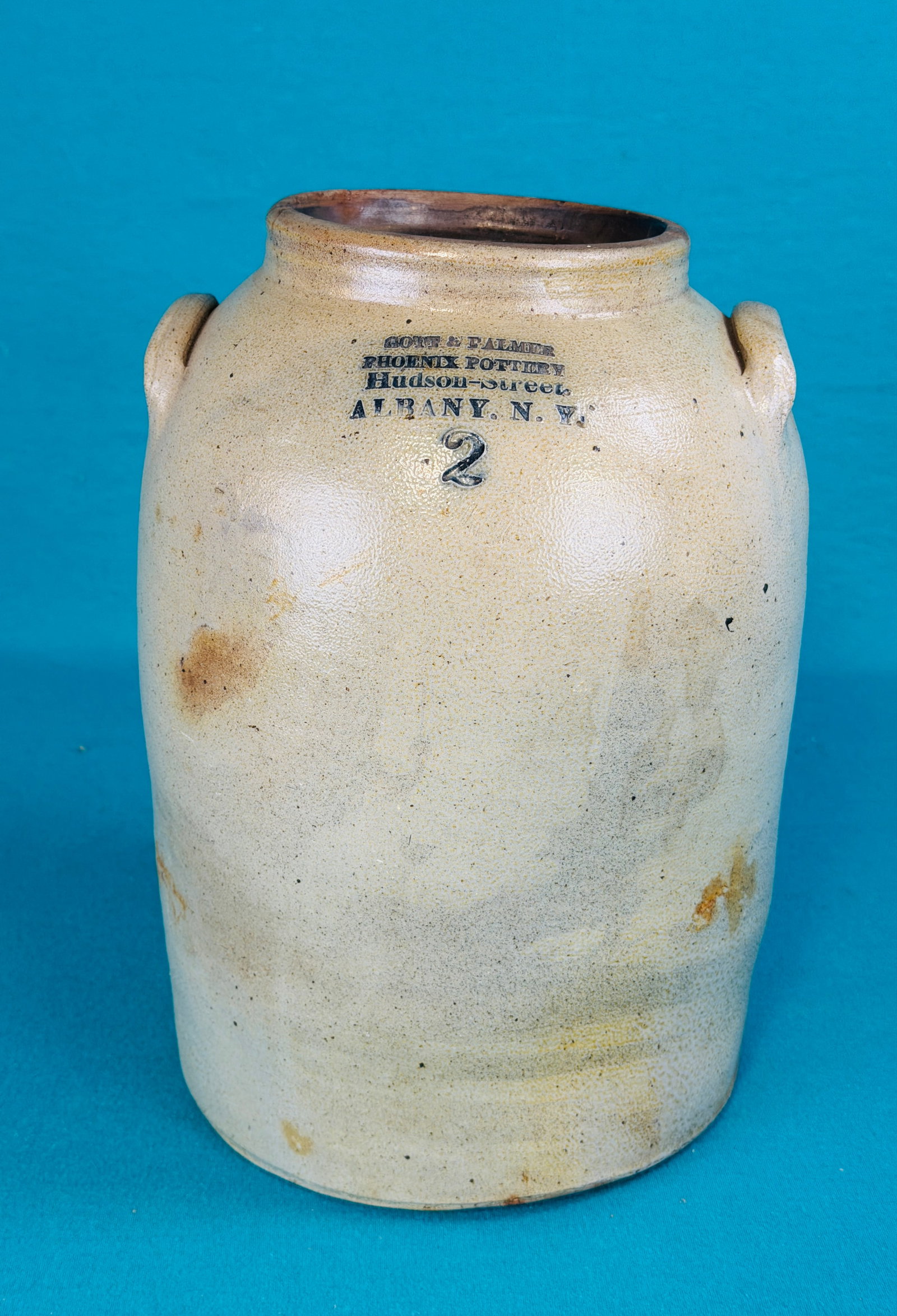 Gott & Palmer Phoenix Pottery Stoneware Jar: Scarce straight sided two gallon stoneware jar which carries the potter mark of Gott & Palmer / Phoenix Pottery / Hudson-Street / Albany N.Y.. Mark was used from 1848-1850. Jar measures approximately 