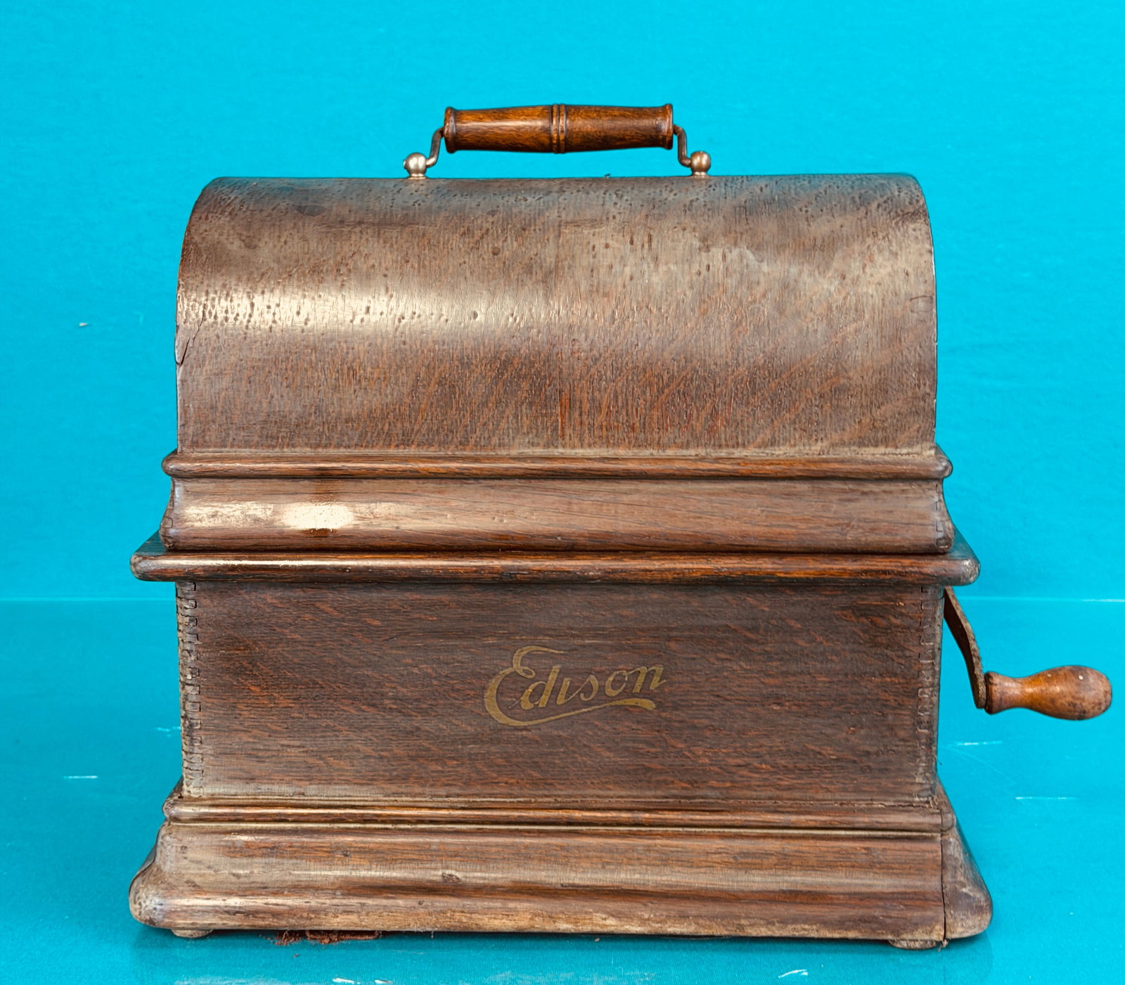 Edison Standard Cylinder Phonograph (as is): Edison Standard Cylinder Phonograph in as is condition lacking reproducer, drive belt and while motor runs mandrel appears stuck and will not turn. Wear to original finish on case as shown. No in hous