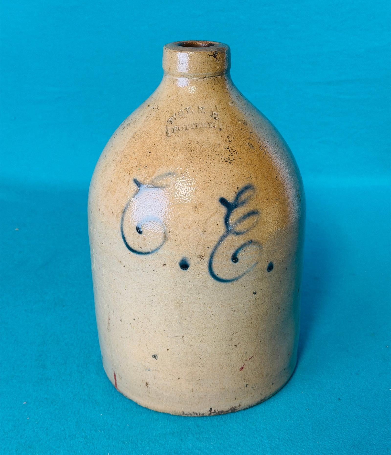 19th C Troy N.Y. Stoneware Jug With Initials: 19th century straight sided stoneware jug which is impressed at shoulder with the potters mark Troy N.Y. Pottery and is decorated on the front with cobalt initials which appear to read C.E.. Condition
