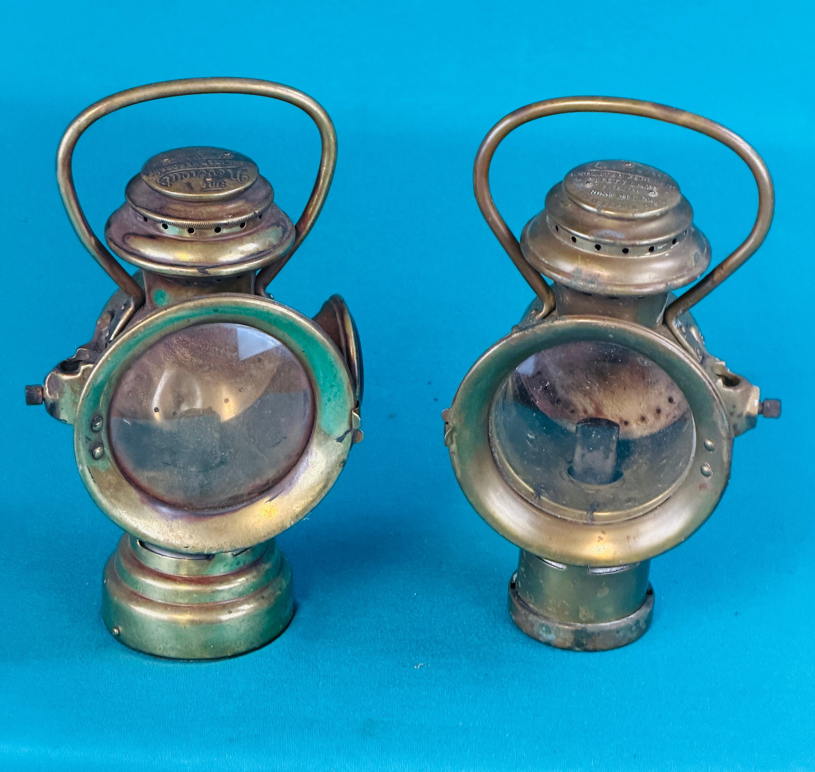 Lot 2 The Neverout Lamps: Lot of two (left and right) The Neverout buggy, carriage or early automobile lamps made by the Rose Manufacturing Company Philadelphia Pa. Lamps are made of brass. Lamps are not a matched pair having 