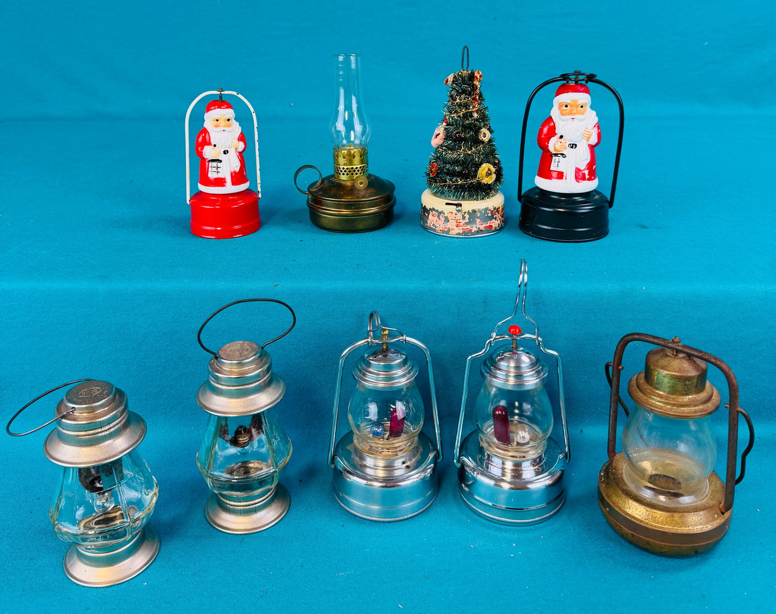 Lot Vintage Christmas Electric Lanterns: Lot of vintage electric Christmas lanterns which include two which are figural in the form of Santa Claus and another in the form of a Christmas Tree. Condition - is as shown. In house shipping availa