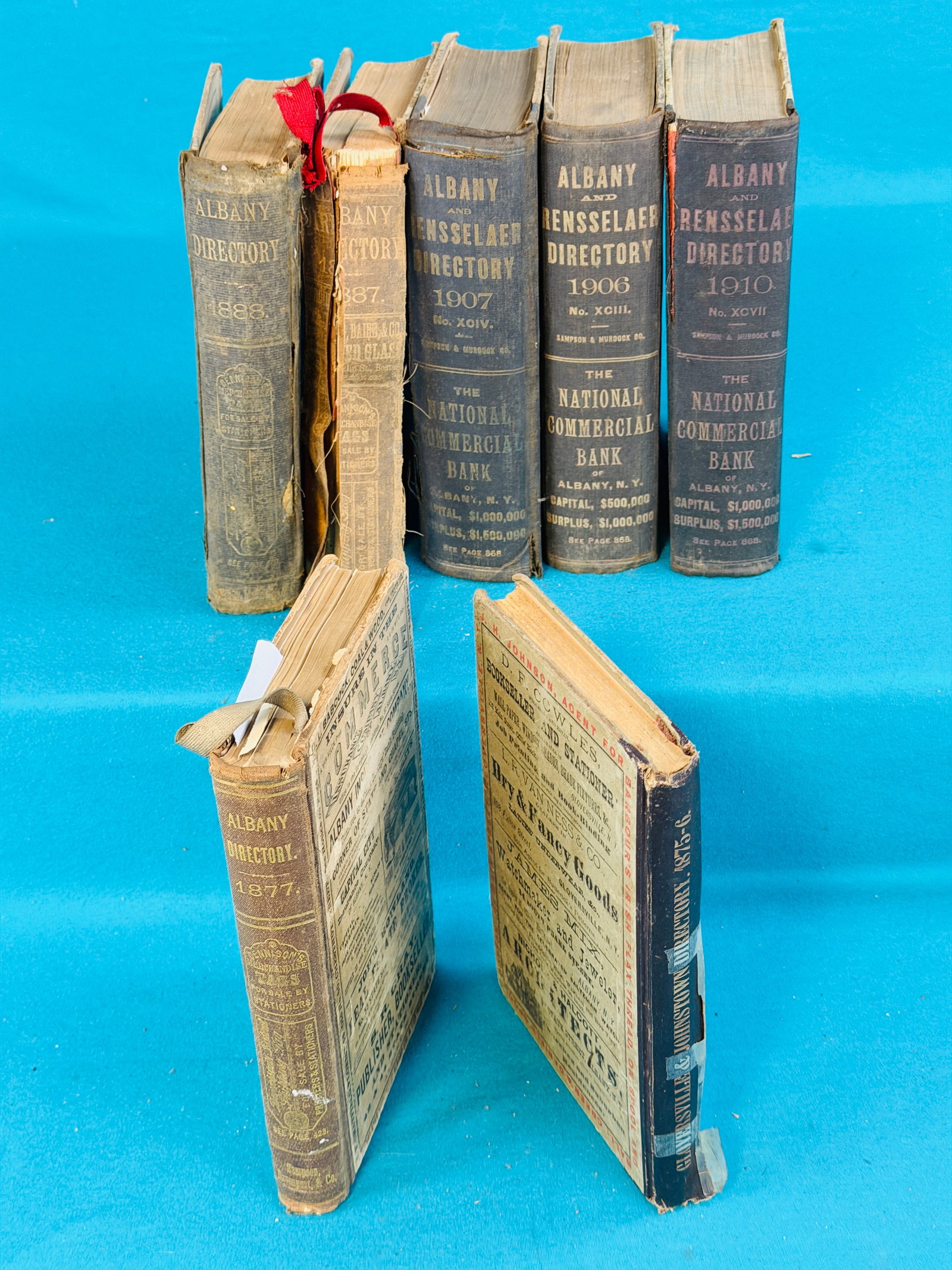 Lot 7 Early Albany New York Directories: Lot seven antique Albany New York directories which include the following years; 1875-76; 1877; 1887; 1888; 1906; 1907 and 1910. Condition - as shown with wear to spines and covers. In house shipping 