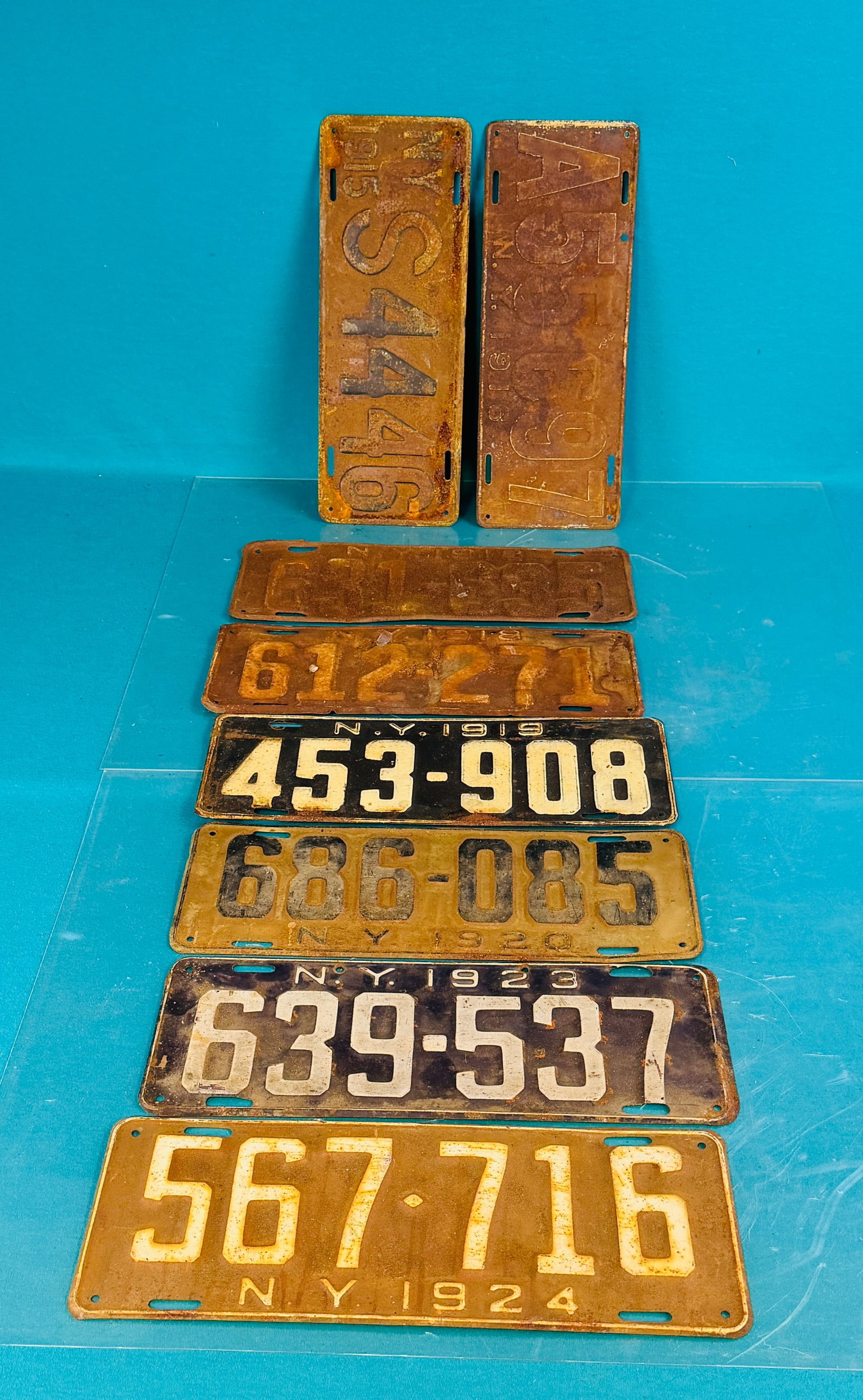 Lot 8 1915-1920's NY License Plates: Lot of eight 1915-1920's New York State license plates. Condition - is as shown. In house shipping is available on this lot. Approximate weight is 8 pounds.