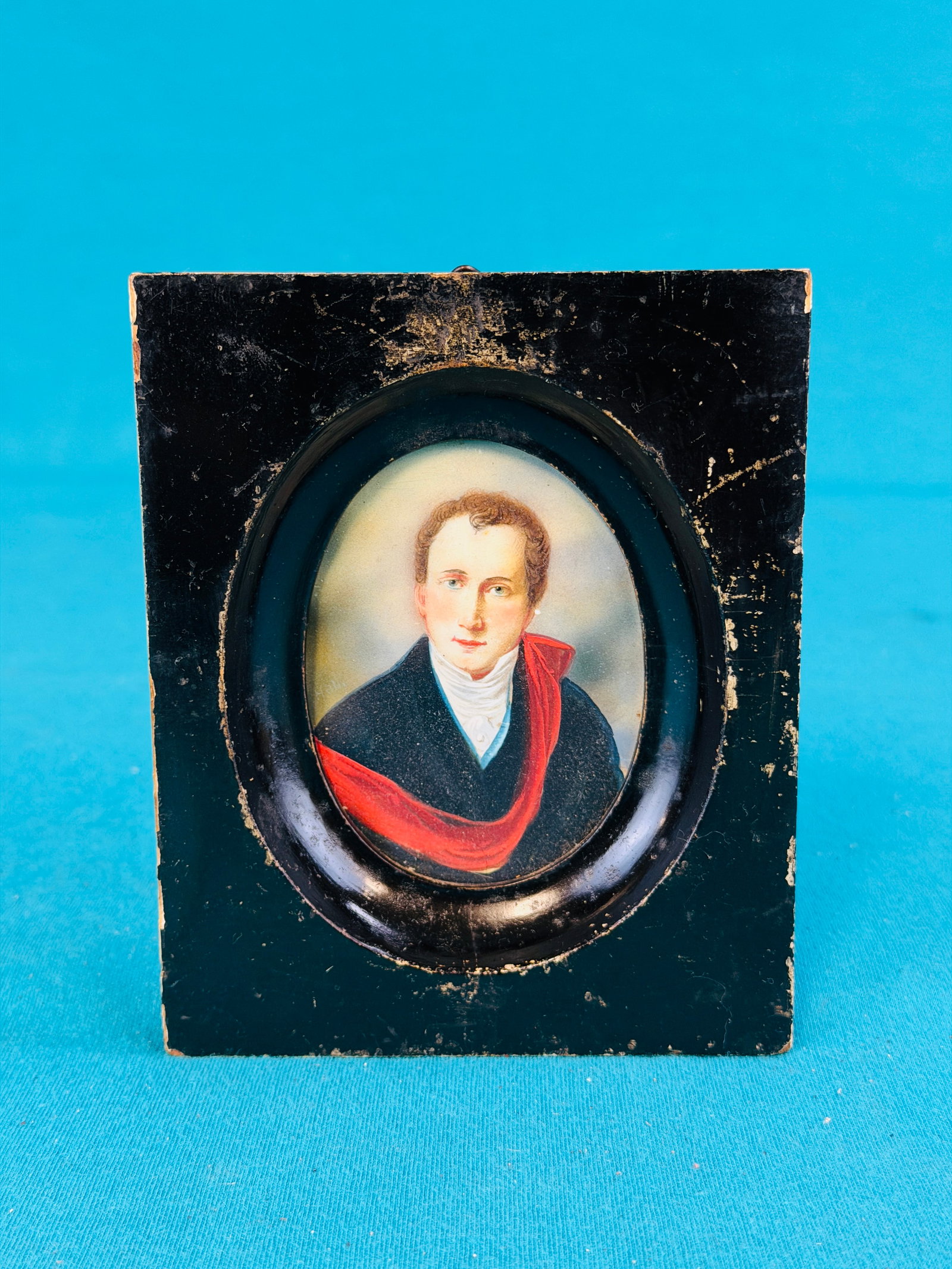 19th C Framed Portrait On Ivory: Antique 19th century miniature portrait of a gentleman on ivory in what appears to be its original worn black painted frame. Item measures approximately 5 1/8" by 4 1/8". Condition - wear to the black