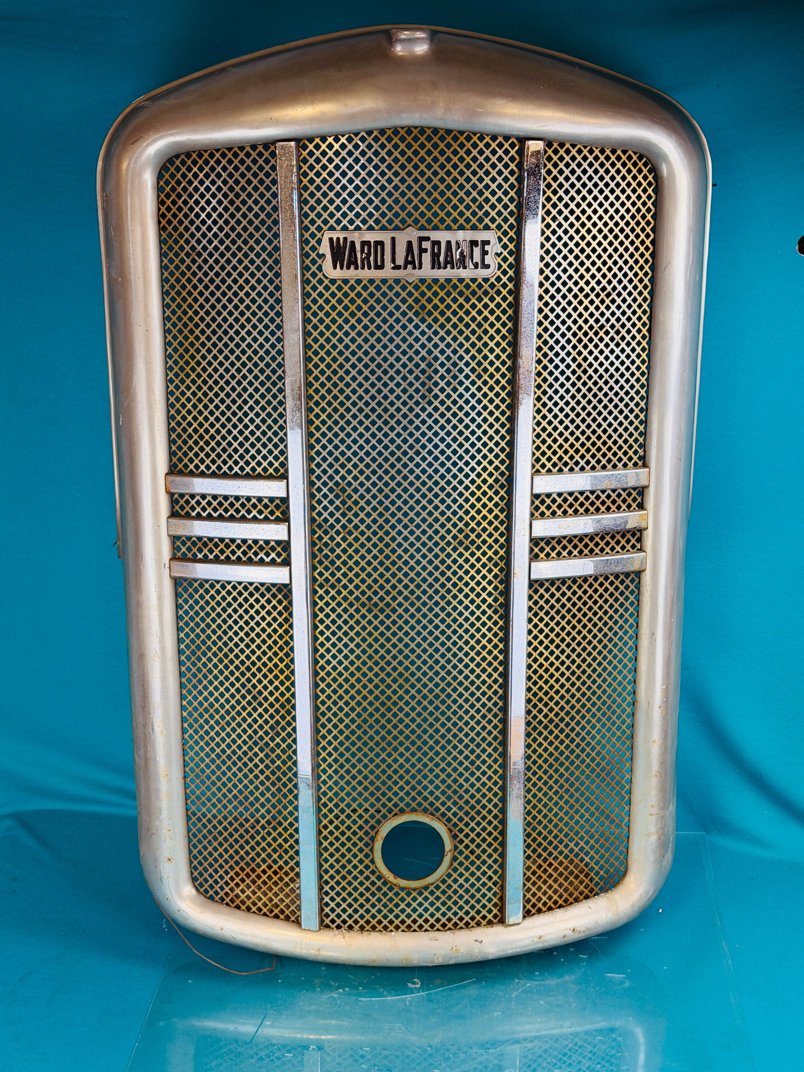 Excellent Vintage Ward LaFrance Fire Truck Grill: Excellent I believe circa 1940's Ward LaFrance Elmira Heights New York (1916-1979) nickel fire truck grill which measures approximately 44 1/2" tall by 29" wide and weights approximately 48 pounds. Co