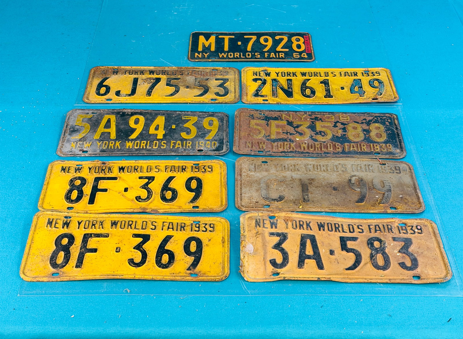 Lot of 9 1939-40 NY World's Fair License Plates (1 of 5)