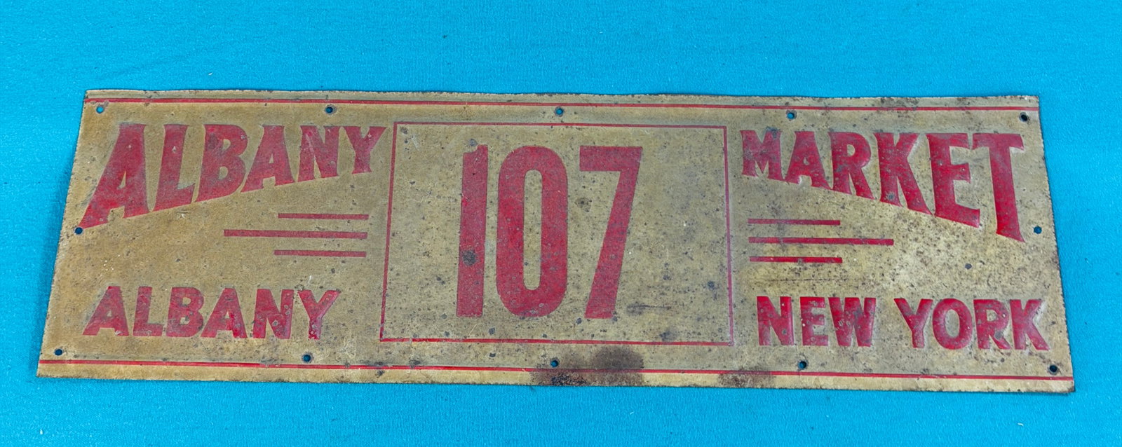 Vintage Embossed Tin License Albany Market: Vintage embossed tin sign / license for the Albany Market in Albany New York (Menands Market?). I think this was a fruit peddlers license. Item measures approximately 18" by 5 1/4". Condition - has ev