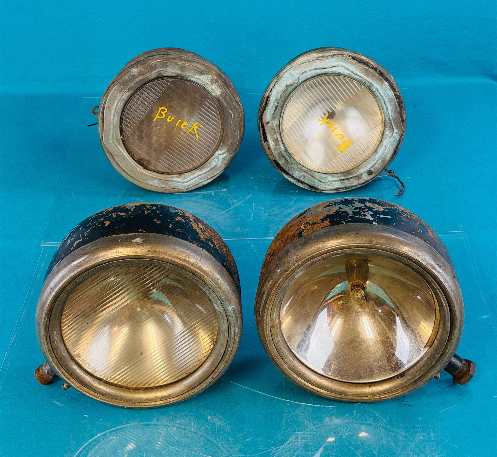 Lot of 2 Pair Antique Automobile Headlights: Lot of two matching pairs of antique automobile headlights one of which is for a Buick. Condition - as shown in need of restoration. No in house shipping is available on this lot. Approximate weight o