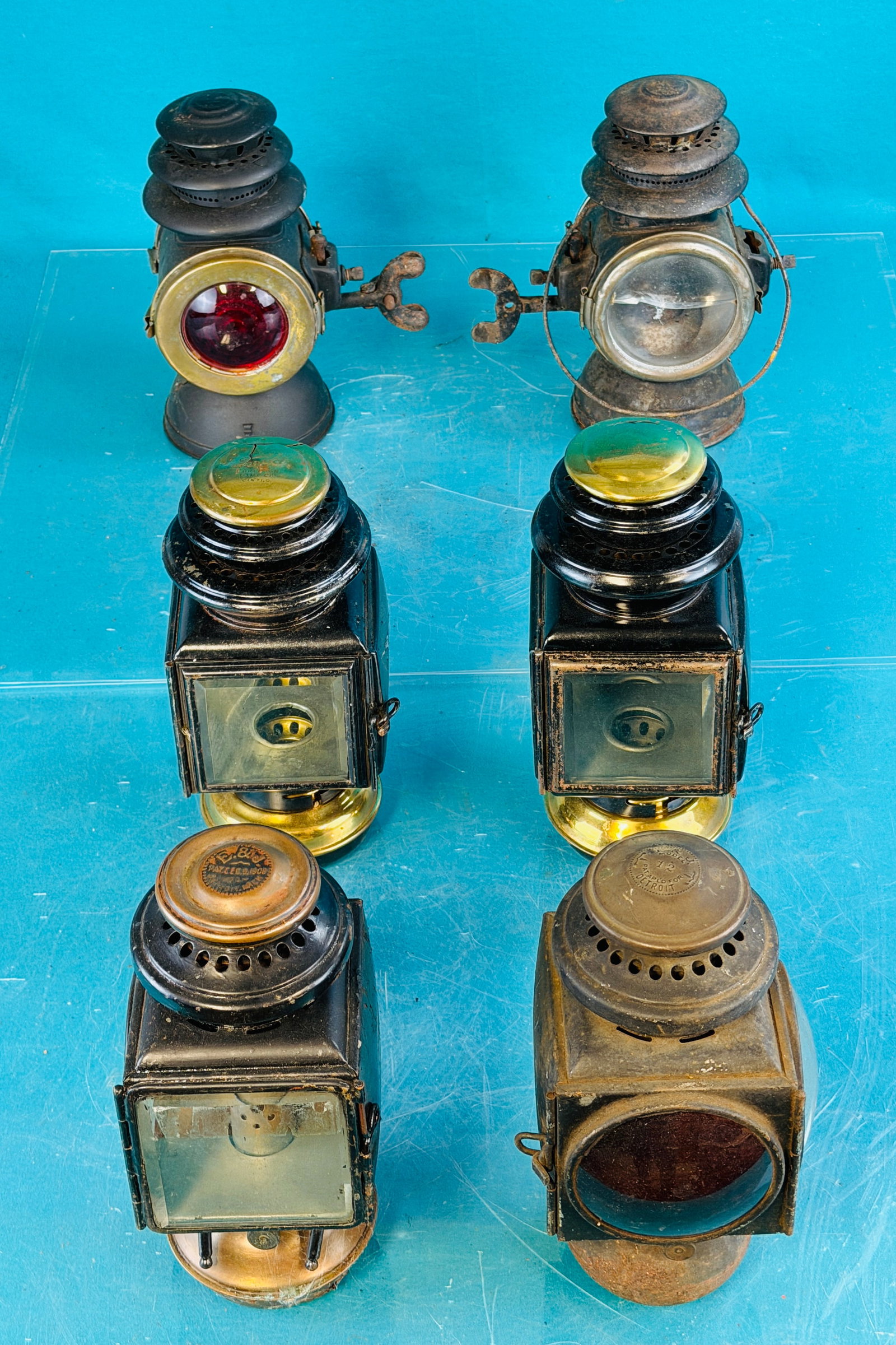 Lot 3 Pair Antique Automobile Lamps: Lot of three pair of antique automobile lamps which include a pair marked on the font Rayo Driving Lamps with clamps, pair E & J Model 12 kerosene automotive lamps and finally two marked Corcoran Lamp