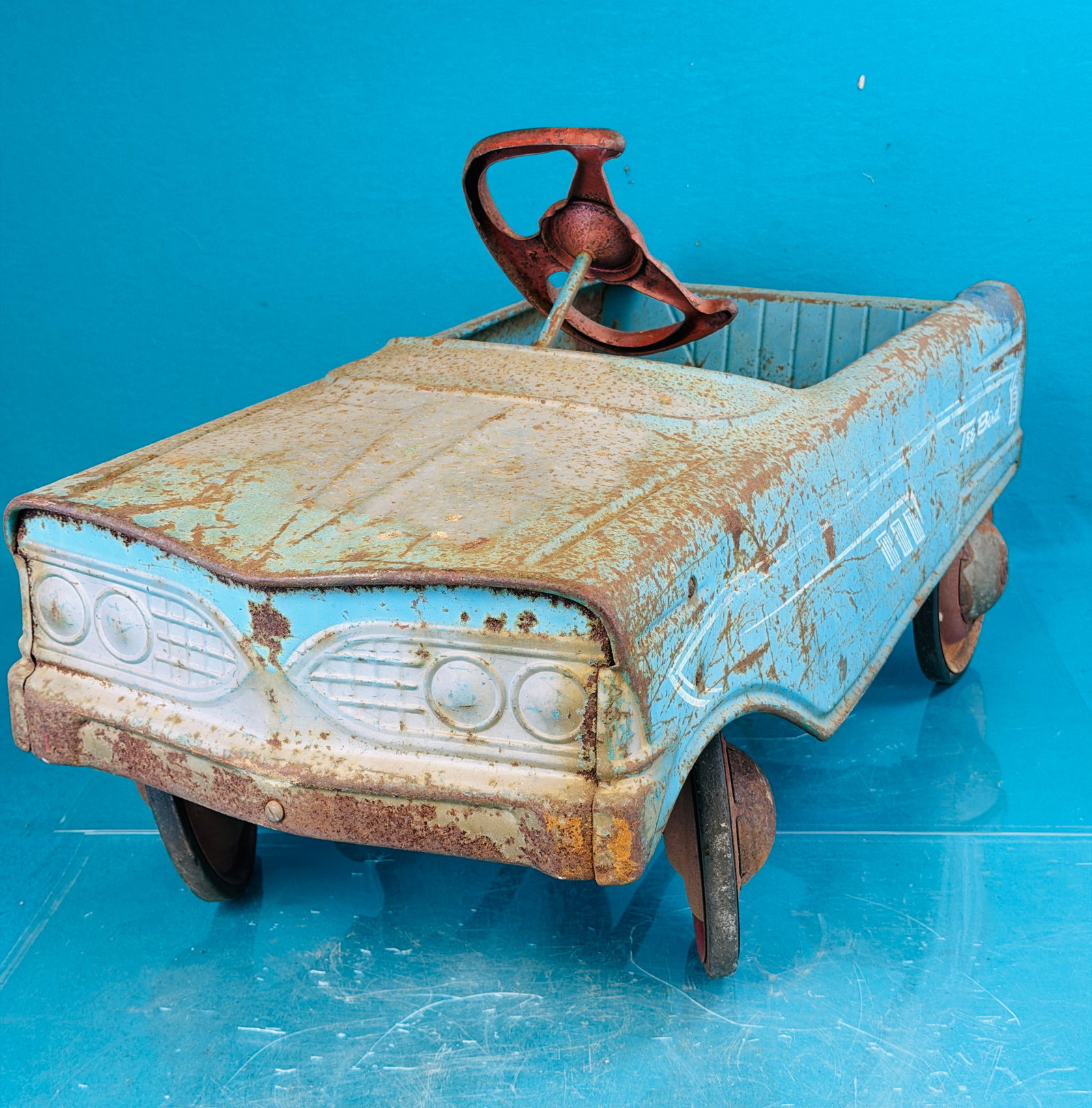 1960's Murray Tee Bird Pedal Car: 1960's Murray V front Tee Bird child's pedal car which measures approximately 32" long and is 14" wide. Condition - as found condition with wear and surface oxidation to its original factory paint. No