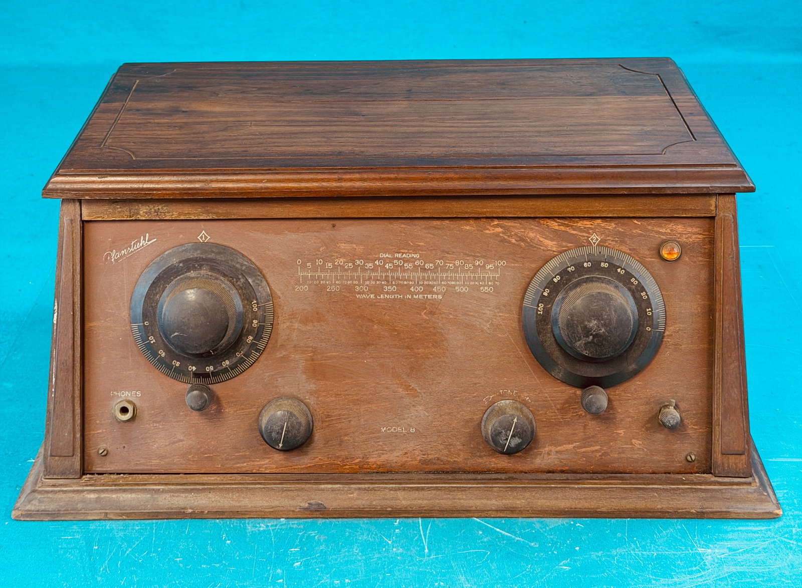 1920's Pfanstiehl Model 8 Radio Receiver: Antique circa 1924-25 Pfanstiehl Model 8 radio receiver which comes with five tubes and measures approximately 21" wide by 14 1/2" deep. Condition - is as shown. No in house shipping is available on t
