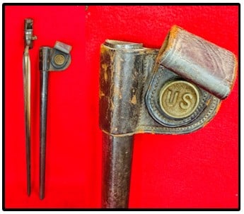 US Marked Triangular Socket Bayonet & Scabbard: U.S. marked both bayonet and scabbard. Bayonet has a triangular blade and is marked on the ricasso U.S. while the scabbard has a cast brass US insignia on the frog while the sheath is made of metal.