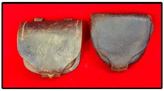 Lot 2 Union Civil War Percussion Cap Pouches: Lot of two Union leather percussion cap pouches. The first is stamped on the flap by the maker E. A. Crossman & Co Newark N.J. along with the inspectors mark E. J. Conart / U.S. Ord Dept etc. The flap