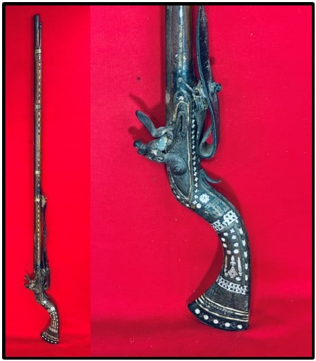 Kyber Flintlock Musket w Brown Bess Lock: Kyber flintlock musket with a Brown Bess lock plate. Stock is heavily inlaid with mother of pearl. Musket functions mechanically as it should and would be rated as being in fair condition.