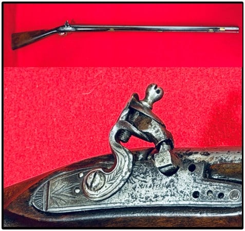 "Ashmore" Militia New England Musket Dated 1831: "Ashmore" militia New England musket which is dated 1831 with a 42" barrel. Musket has a flintlock converted hammer and is proof marked. The stock appears to be made of American cherry. Musket functio