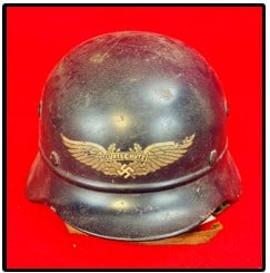 WW2 Third Reich Luftschutz Helmet: World War Two German Third Reich Luftschutz (Civil Air Defense) helmet with what appears to be its original liner and leather chin strap. The interior back edge of the helmet is stamped what appears t