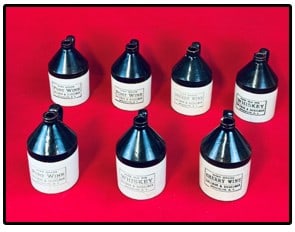 Lot 7 Salzman & Siegelman Brooklyn NY Stoneware Jugs: Lot of seven late 19th to early 20th century stoneware advertising jugs for Salzman & Siegelman Brooklyn New York. Jugs are for this companies various types of whiskey and wines. Condition - three are