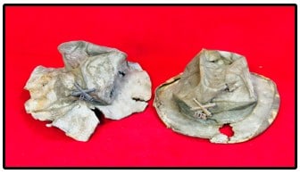 Lot 2 Excavated Spanish American War Campaign Hats: Lot of two Spanish American War era US Army campaign hats with regiment insignia which were excavated by the collector in the Capital District Region. One insignia is for the 9th regiment while the ot