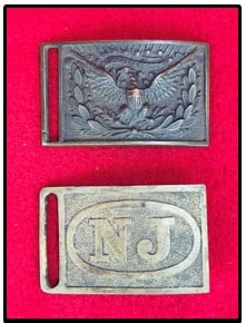 Lot 2 Indian Wars Era Belt Plates Federal & N.J.: Lot of two Indian Wars era solid brass belt plates one being the federal issue with spread winged eagle in laurel wreath and the other is a New Jersey plate. Both plates lack keeper but are otherwise 