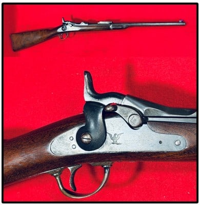 Springfield M-1884 .45-70 Trapdoor SR Carbine: Springfield model 1884 trapdoor saddle ring carbine in .45-70 caliber which has a barrel measuring approximately 20 1/2" in length and has two cartouches. Carbine is serial number 456744 and is all or
