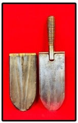 U.S. Model 1873 Springfield Hunting Knife / Entrenching Tool: Original United States Model 1873 Springfield hunting knife / entrenching tool with its leather and brass scabbard. The ringed oak or ash handle is deeply stamped US. Condition - blade shows some mino