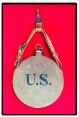 Spanish American War Era US Canteen R.I.A.: Spanish American War era US canteen which was made by and is very lightly marked R.I.A. (Rock Island Arsenal) with what appears to be the date 1898 just below the U.S. on one side. The other side of t