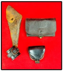 Lot 4 Civil War Era Leather Accessories: Lot of four American Civil War Era Leather accessories which includes a Boyd & Sons Boston cap pouch which is marked lightly on flap US and some hard to read initials below, early leather holster for 
