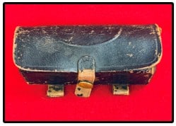 Pattern 1889 US Navy Cartridge Box: Pattern 1889 black leather US Navy cartridge pouch / box which appears to be unmarked as far as maker. There is some wear and while both belt loops are intact one is rather fragile. There is a partial