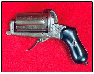 Belgium Pin Fire 6 Shot Pepperbox: Belgium pin fire 6 shot pepperbox revolver which is serial number 24353. Pepperbox functions mechanically as it should and is in very good general condition. A very fine example of a pepperbox revolve