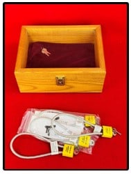 Modern Oak Shadow Box Display Case & Gun Locks: Lot consisting of a nice modern locking deep oak glass topped display case which measures approximately 12" by 9" and is 5" deep complete with two keys together with four gun locks two of which are